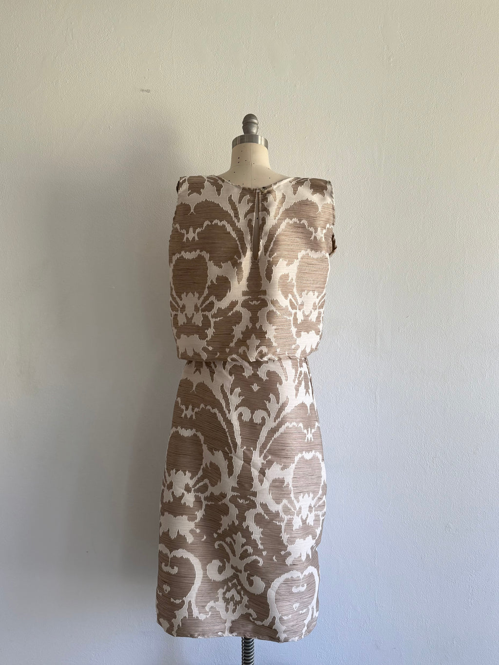 Elegant Women's Two-Piece Brocade Set: Cream and Bronze Top and Skirt